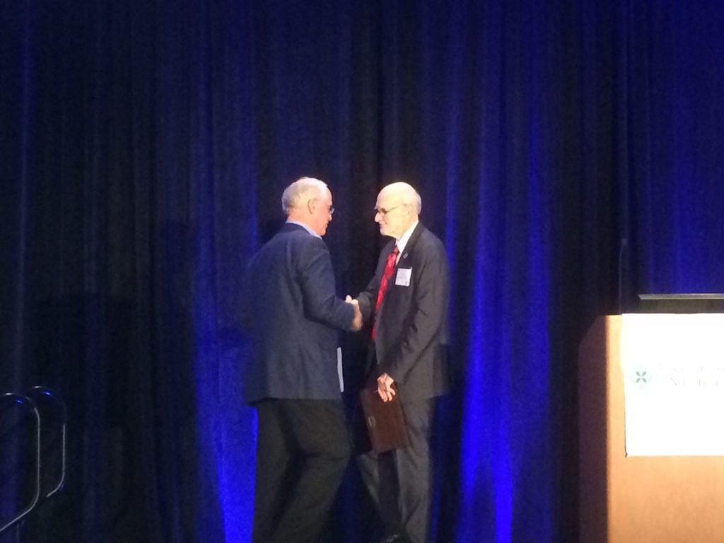 Dr. Kaats accepting the Ragus Award