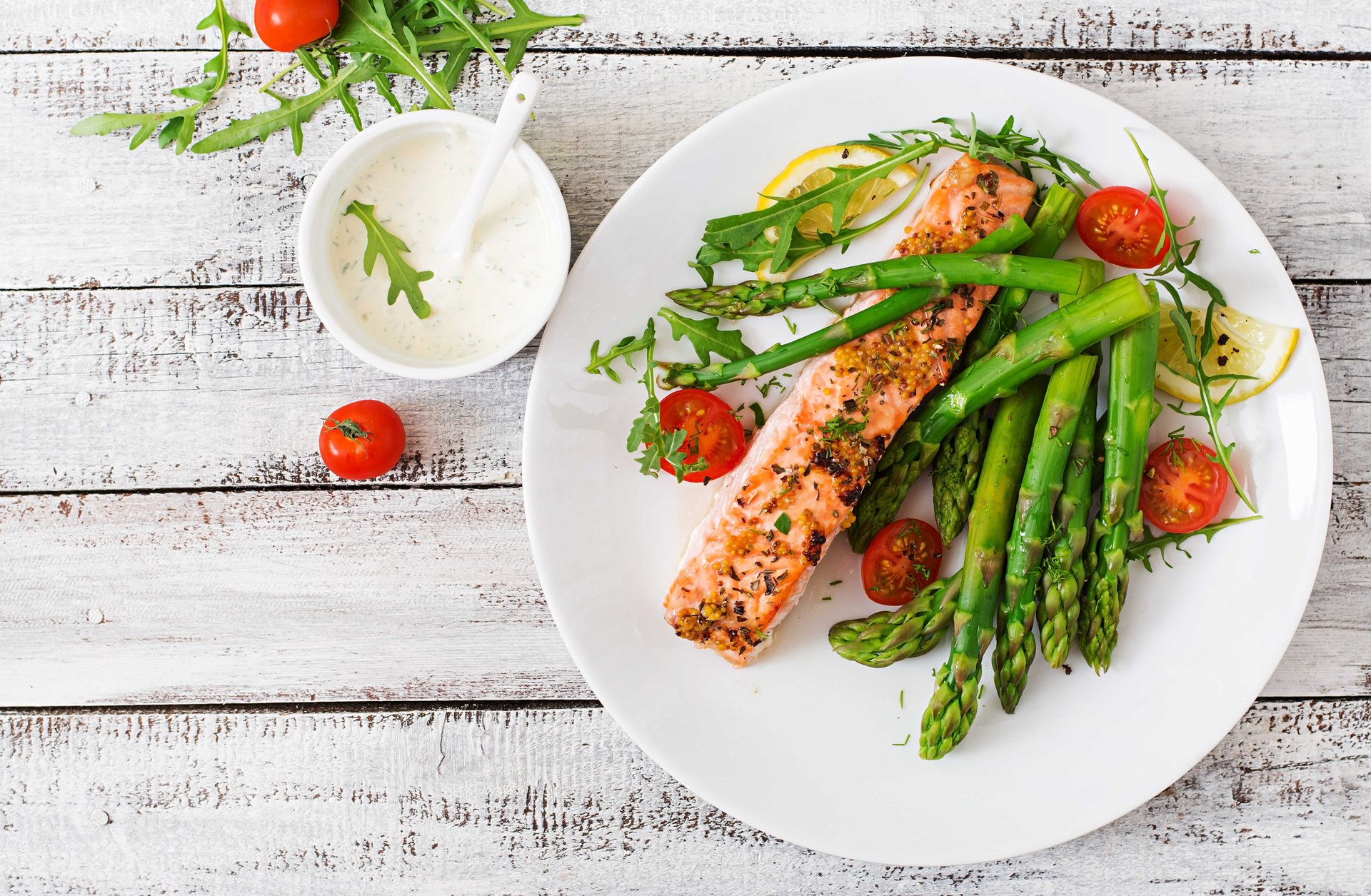 baked salmon with herbs, tomatoes and asparagus