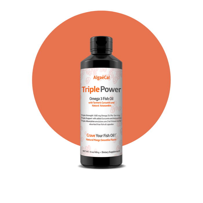 Triple power fish oil bottle in front of orange circle