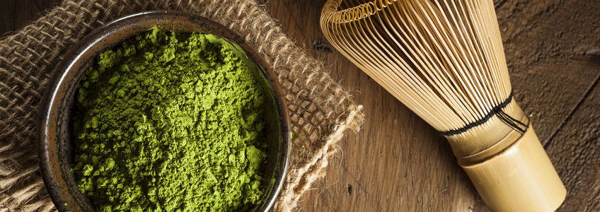 Raw organic green matcha tea in a bowl